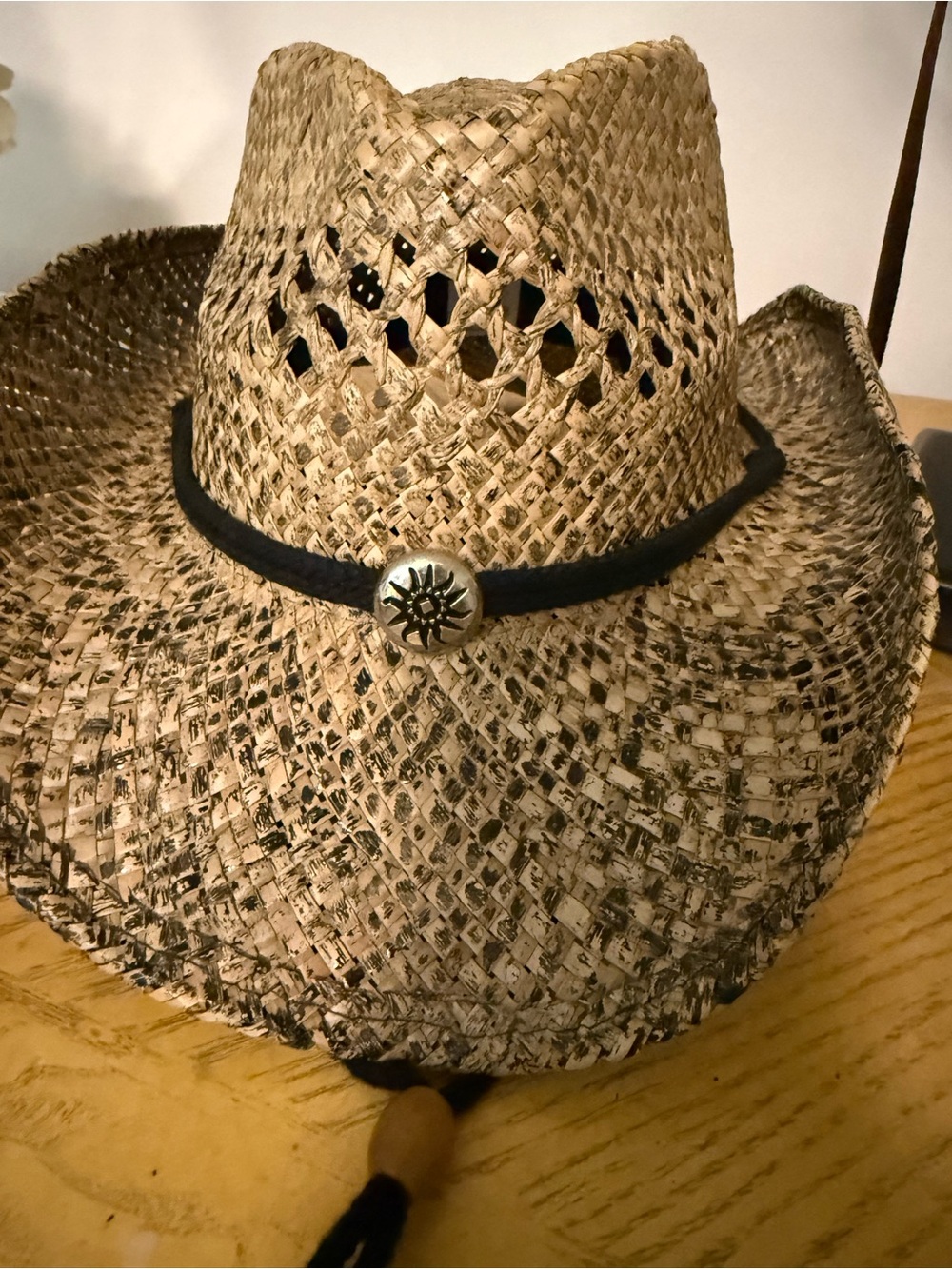 Straw Cowboy Hat with Black Band and Sun Concho